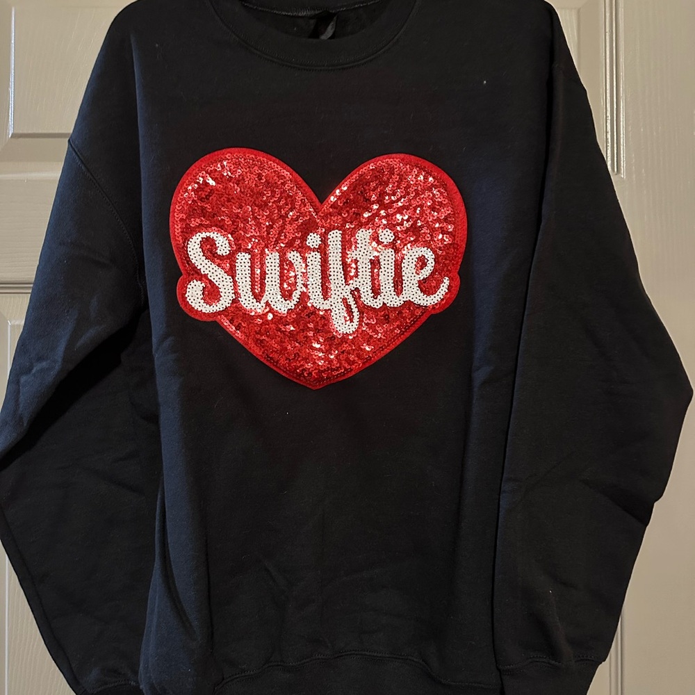 Black Sweater with Red Heart Design